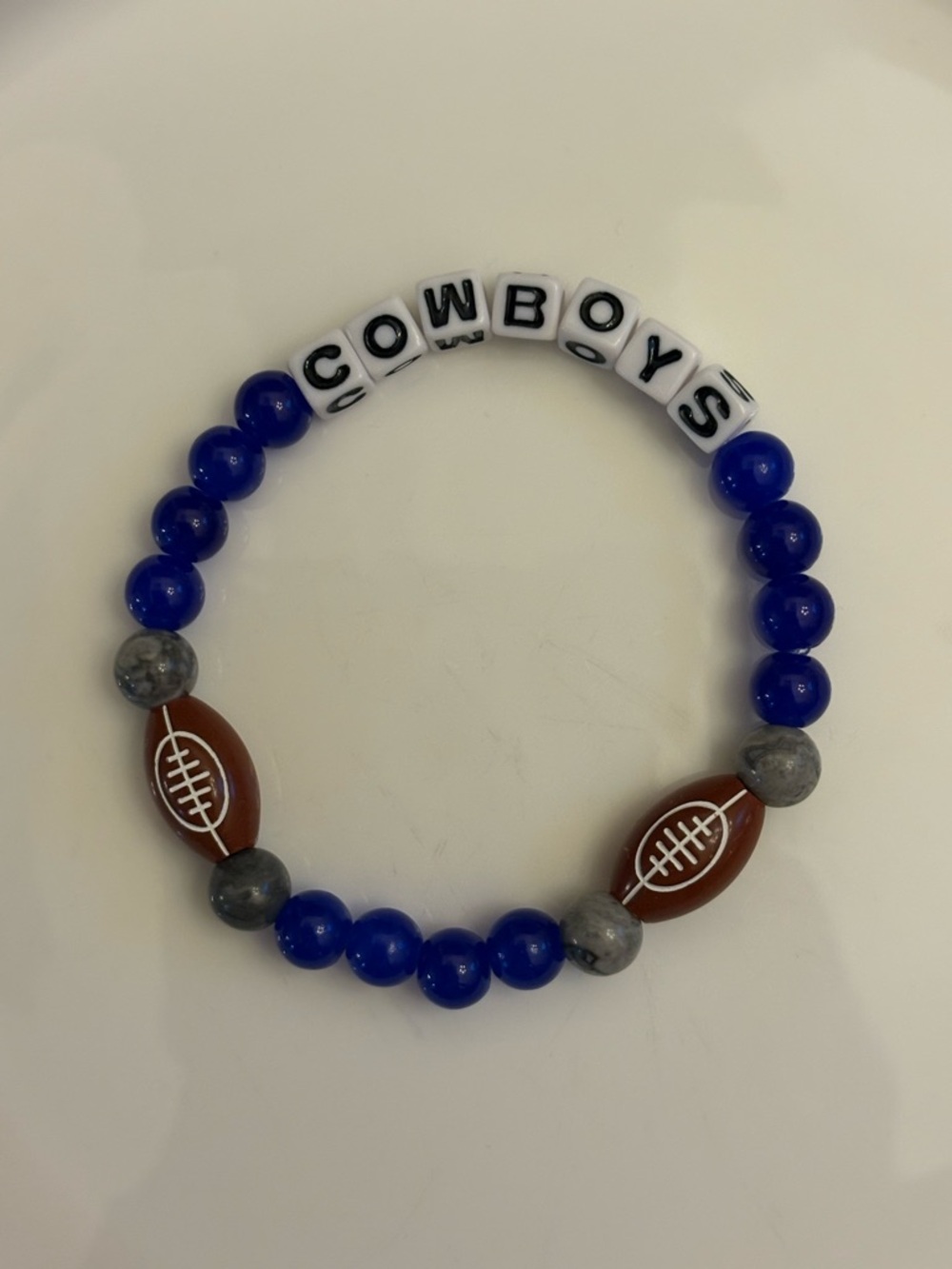 Stretch Beaded Bracelet with Blue Beads and Football Charms